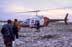 Bording helicopter that has landed on tundra